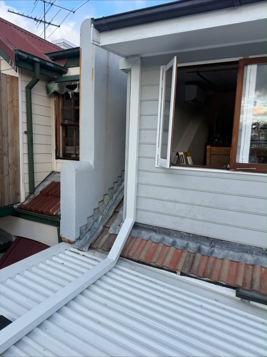Roof and guttering work completed during an air conditioning installation